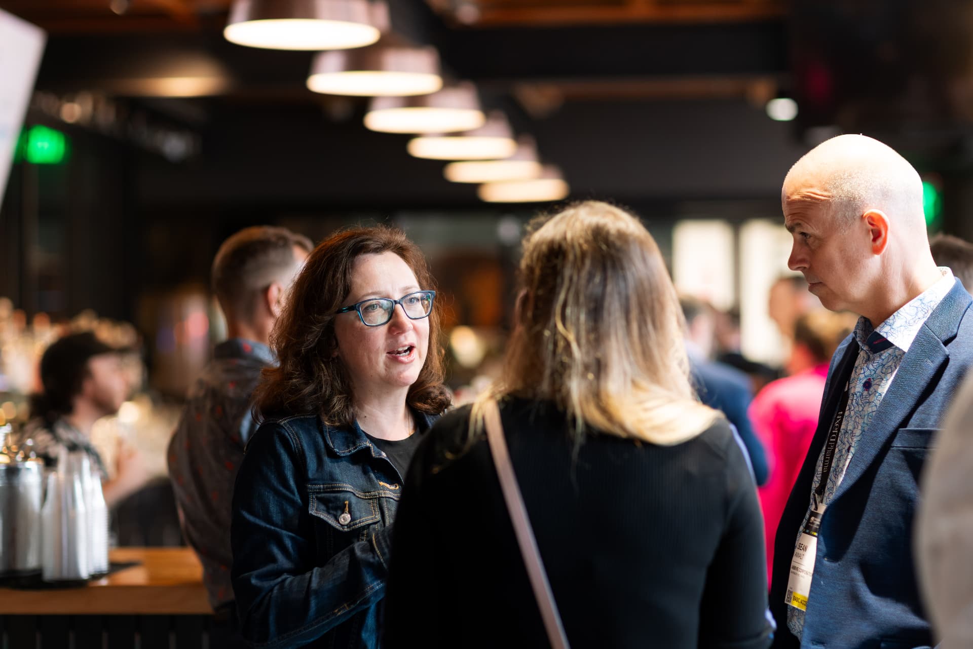 Delegates in conversation at a networking event