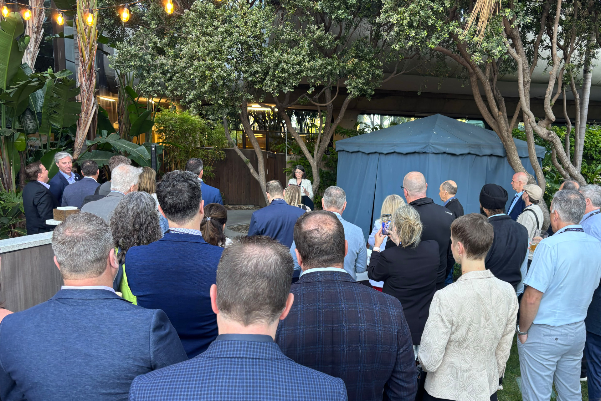 Audience listening to remarks at the reception