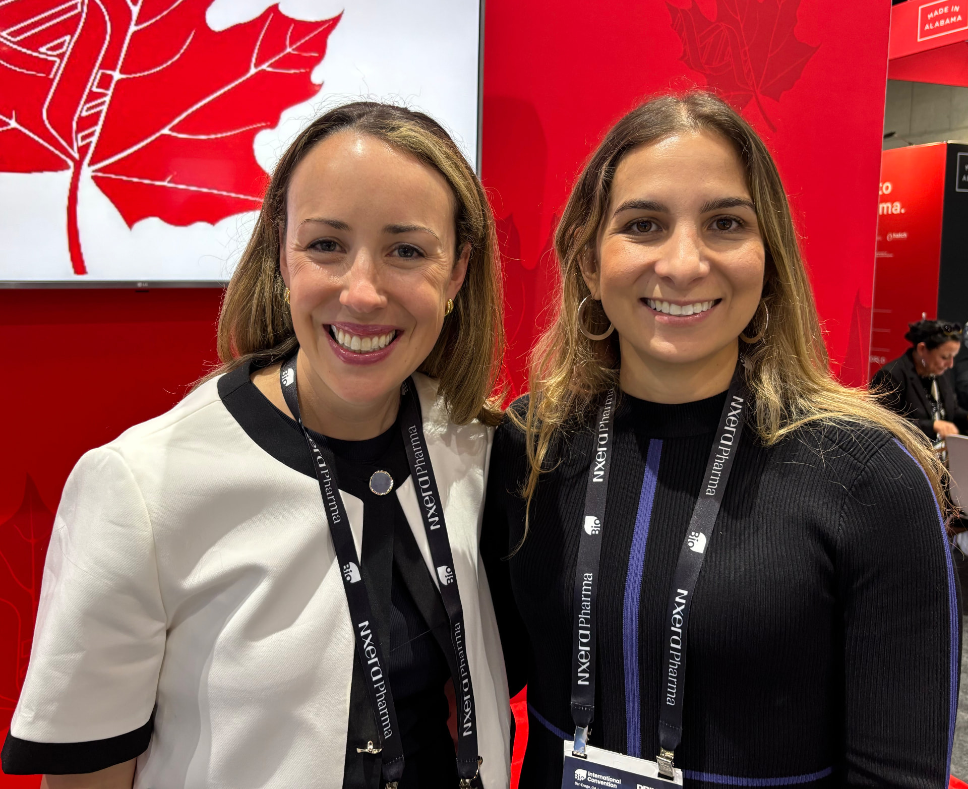 Two delegates at the Canada Pavilion